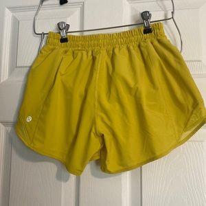 Lululemon yellow low rise shorts size 4.